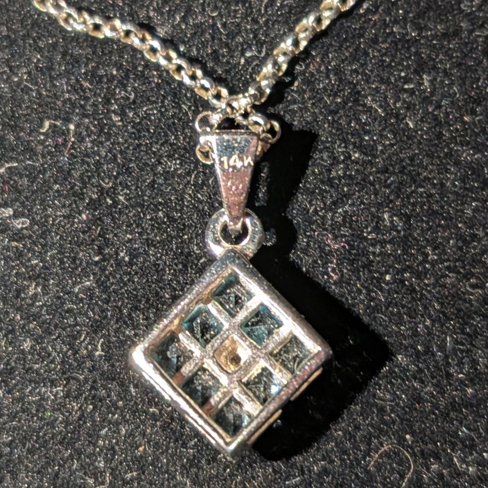 Elegant Silver and Blue Topaz Pendant Necklace - Picture 2 of 2